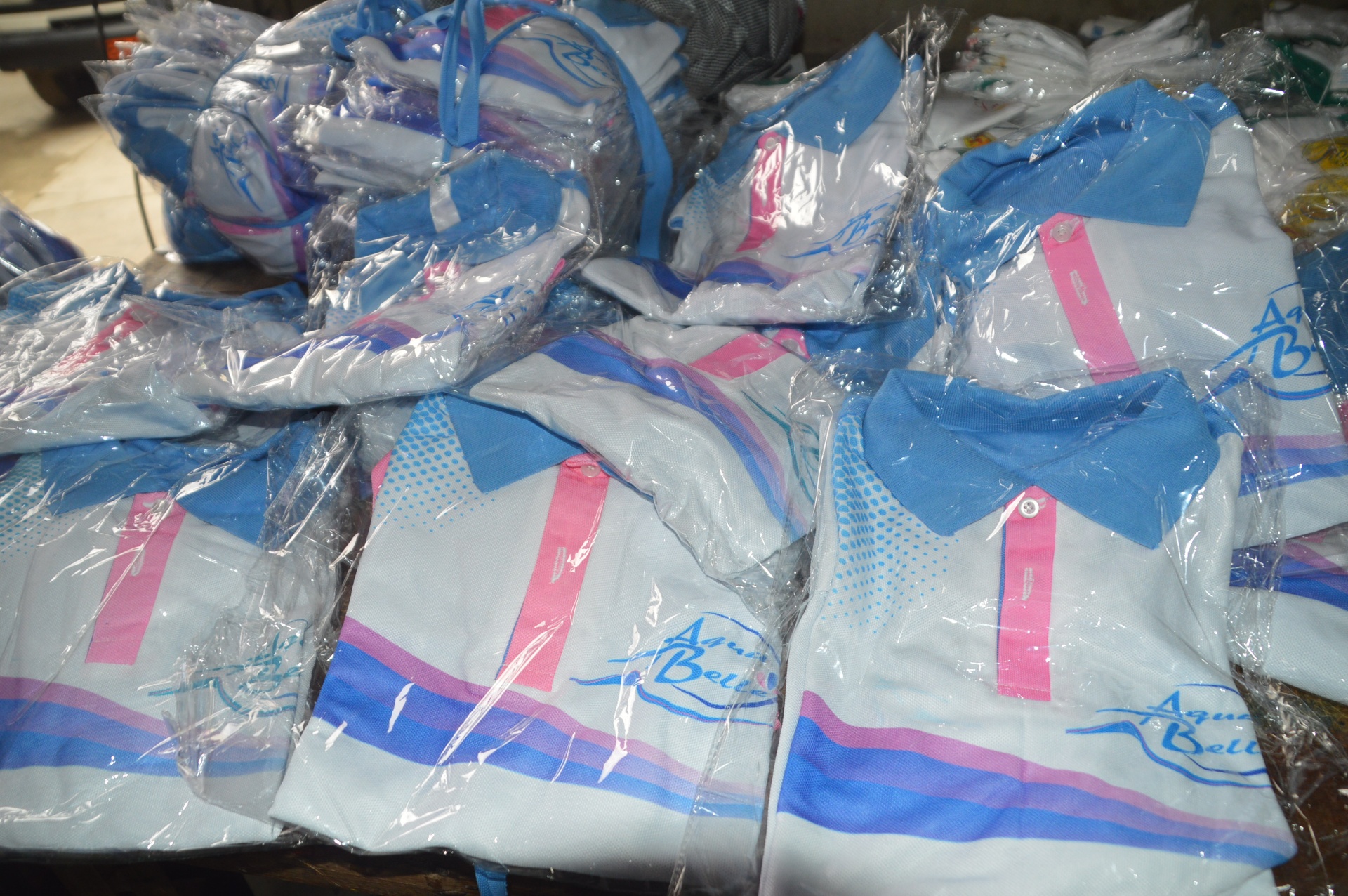 Polos sublimés — Aqua Bell